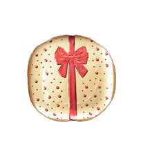 Charger l'image dans la galerie, Assiette plate dorée avec nœud papillon rouge 21x21x2cm
