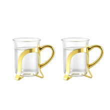 Charger l'image dans la galerie, Tasses à café en verre avec déco en métal doré - lot de 2
